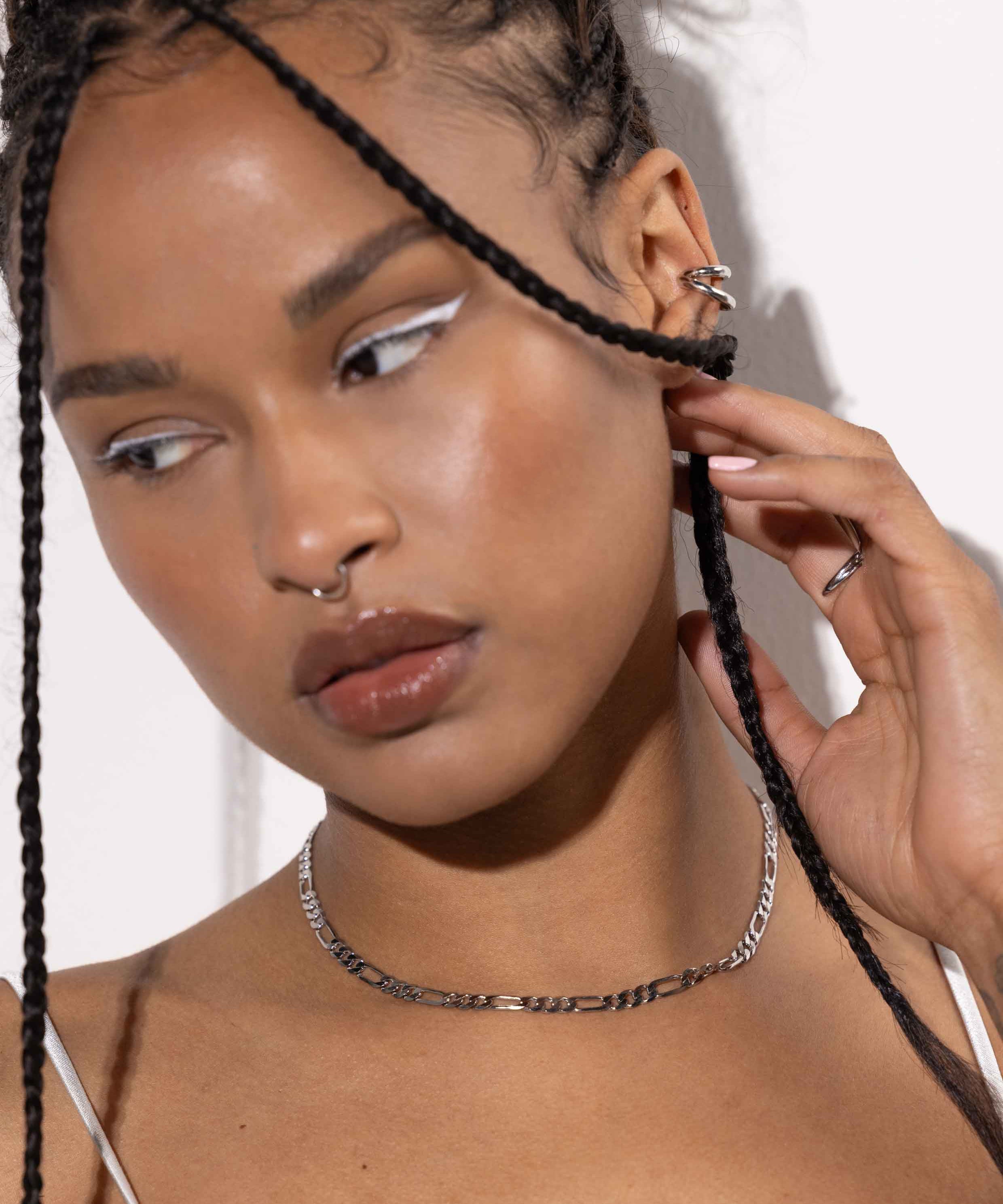 Women Wearing Double Hoop Silver Ear Cuff