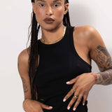 Women wearing gold chain necklace